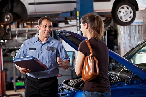 Mechanic With Customer